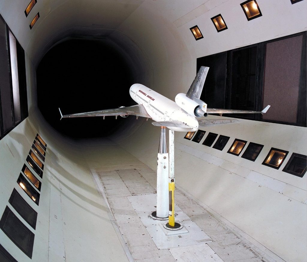 NASA wind tunnel with the scale model of the MD-11 wide-body airliner. Adopted from “Wikipedia”.