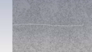 Unstructured mesh with triangular elements for sinusoidal motion of wall CFD simulation in ANSYS Fluent; left shows initial mesh, right shows deformed mesh